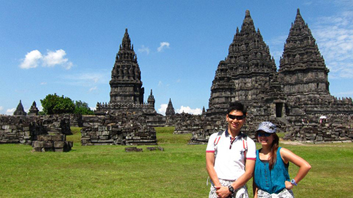 It's us and the ancient hindu temples on the green grass against the blue skies