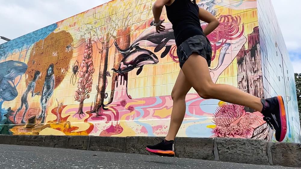 Running past the colourful murals of Auckland